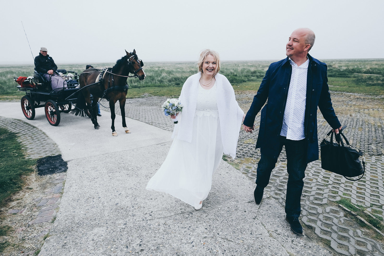 Hochzeitsfotograf Brautpaar in Sankt Peter-Ording Westerhever Westerhversand Nordfriesland Leuchtturm